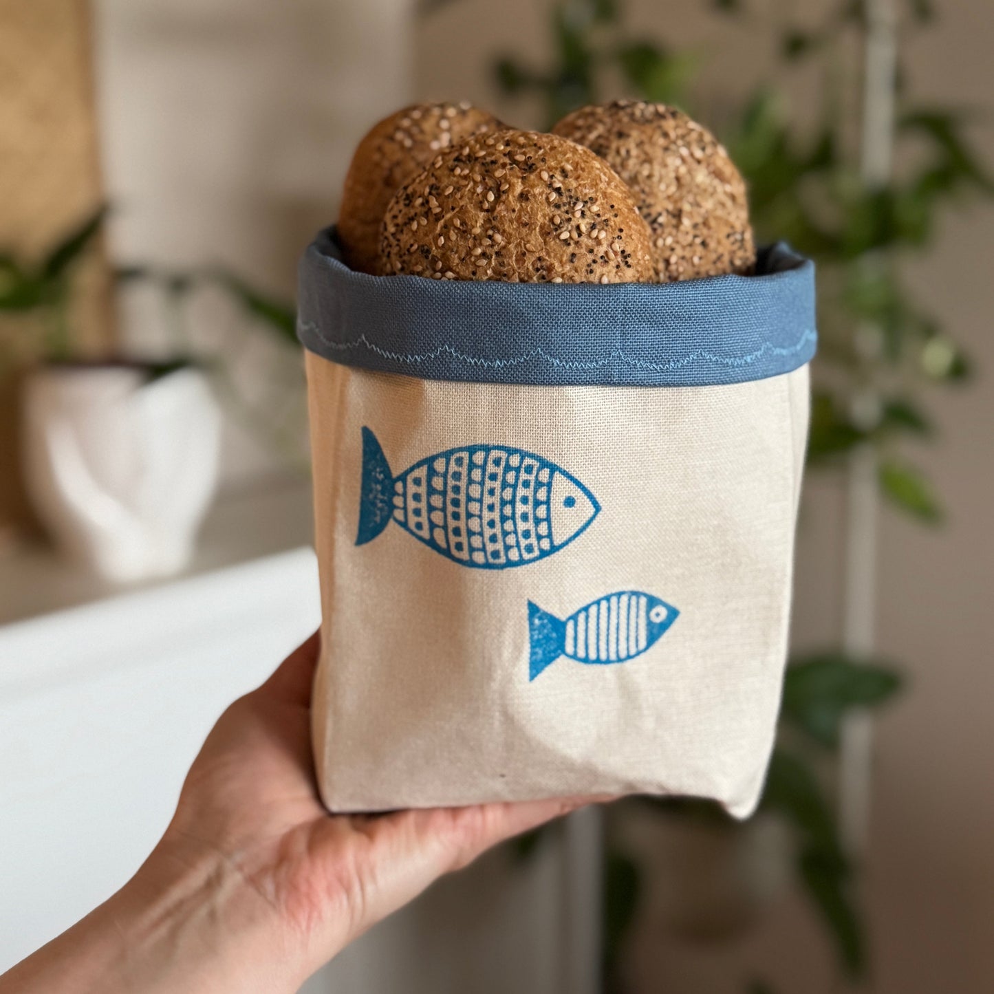 Reversible block-printed fabric storage basket in fish print, handmade cotton basket by Emena Home UK