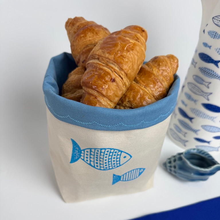 Reversible block-printed fabric storage basket in fish print, handmade cotton basket by Emena Home UK
