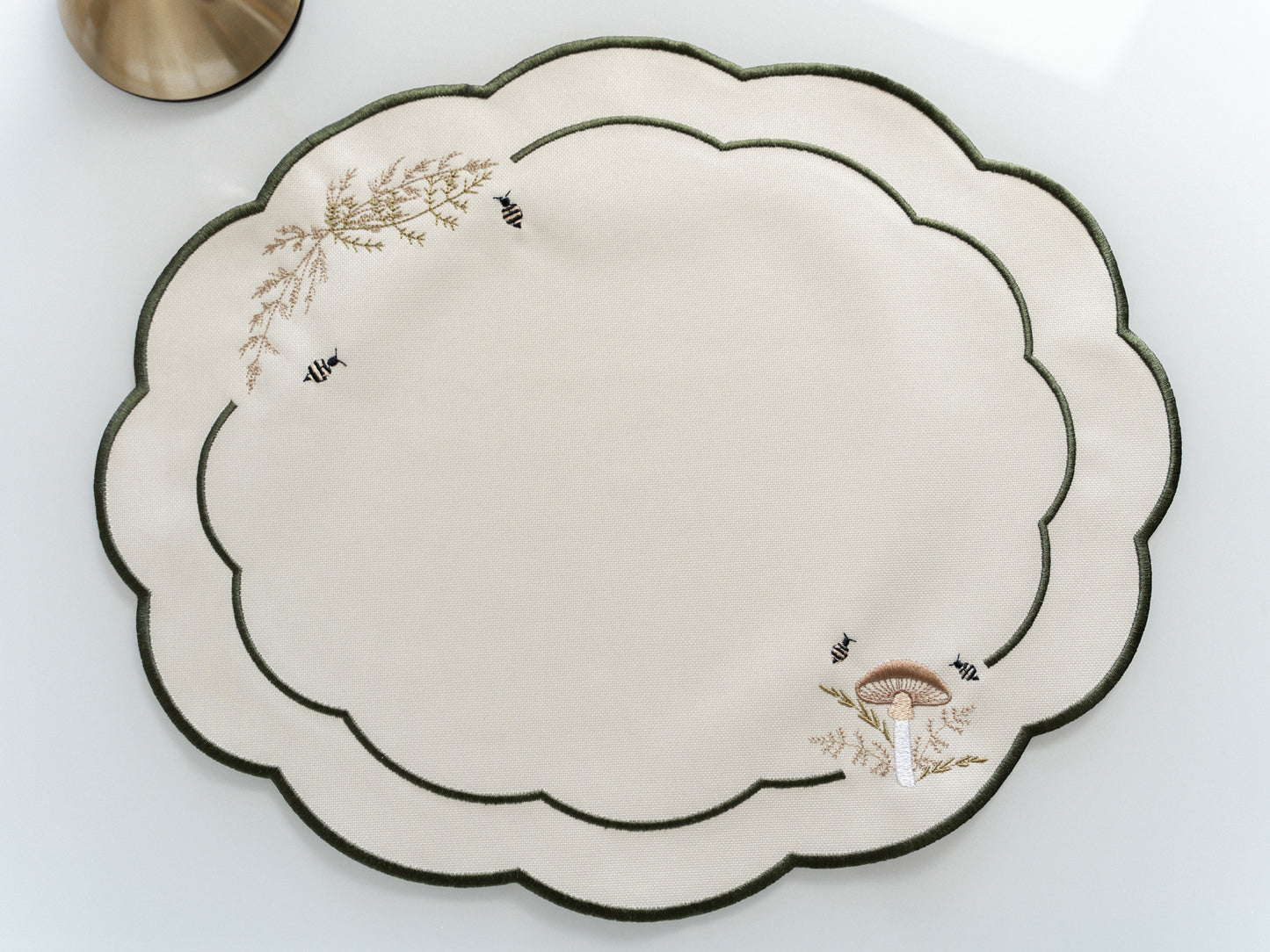 Oval Scallop Placemat - Embroidered toadstool