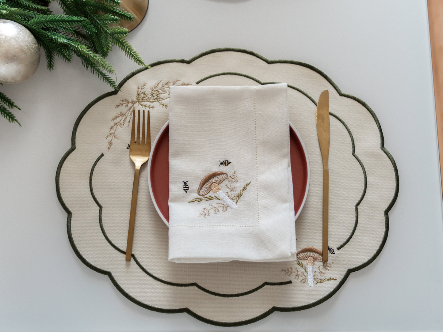 Oval Scallop Placemat - Embroidered toadstool
