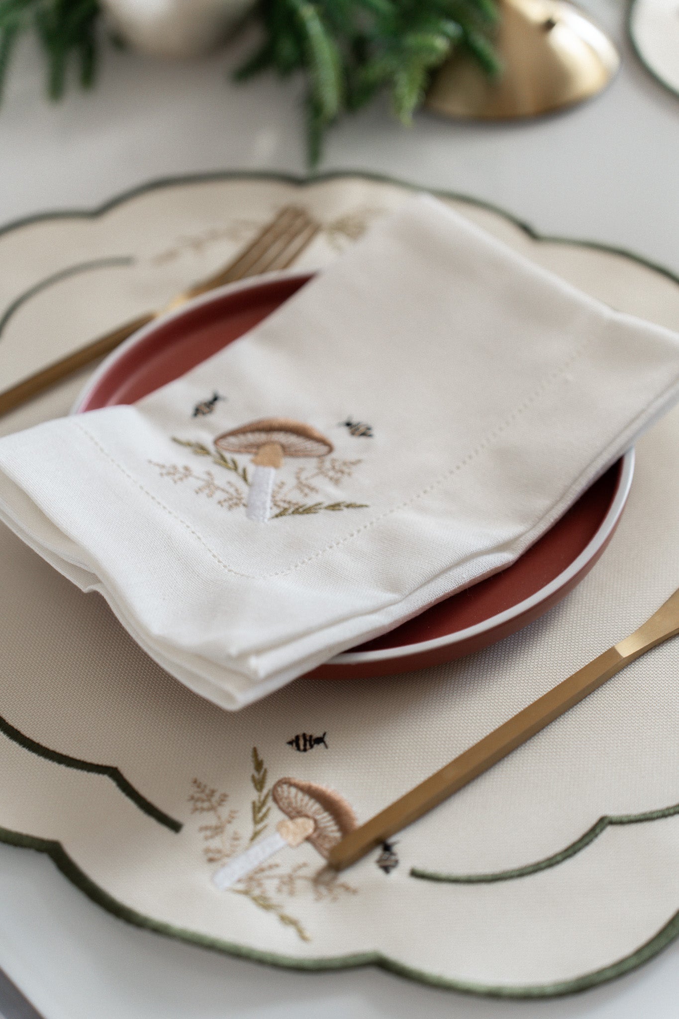 Oval Scallop Placemat - Embroidered toadstool