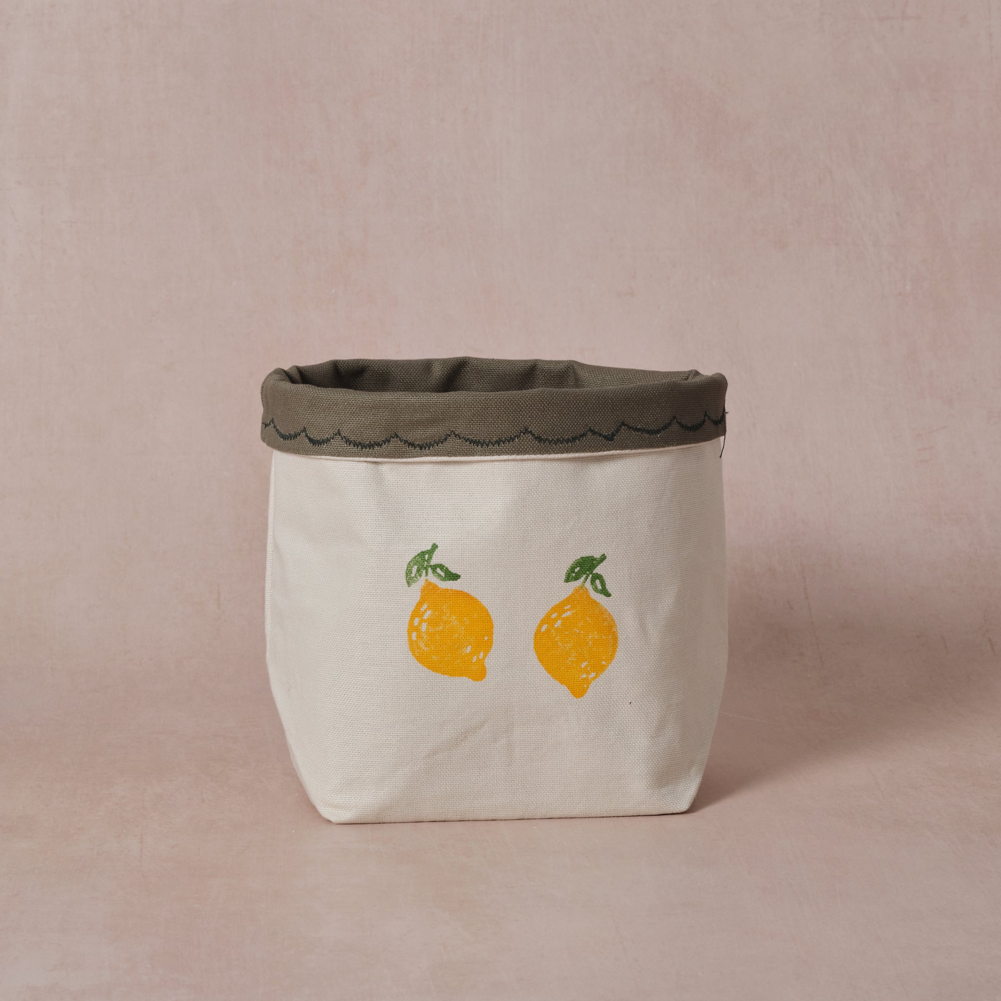 Reversible block-printed fabric storage basket in lemon print, handmade cotton basket by Emena Home UK