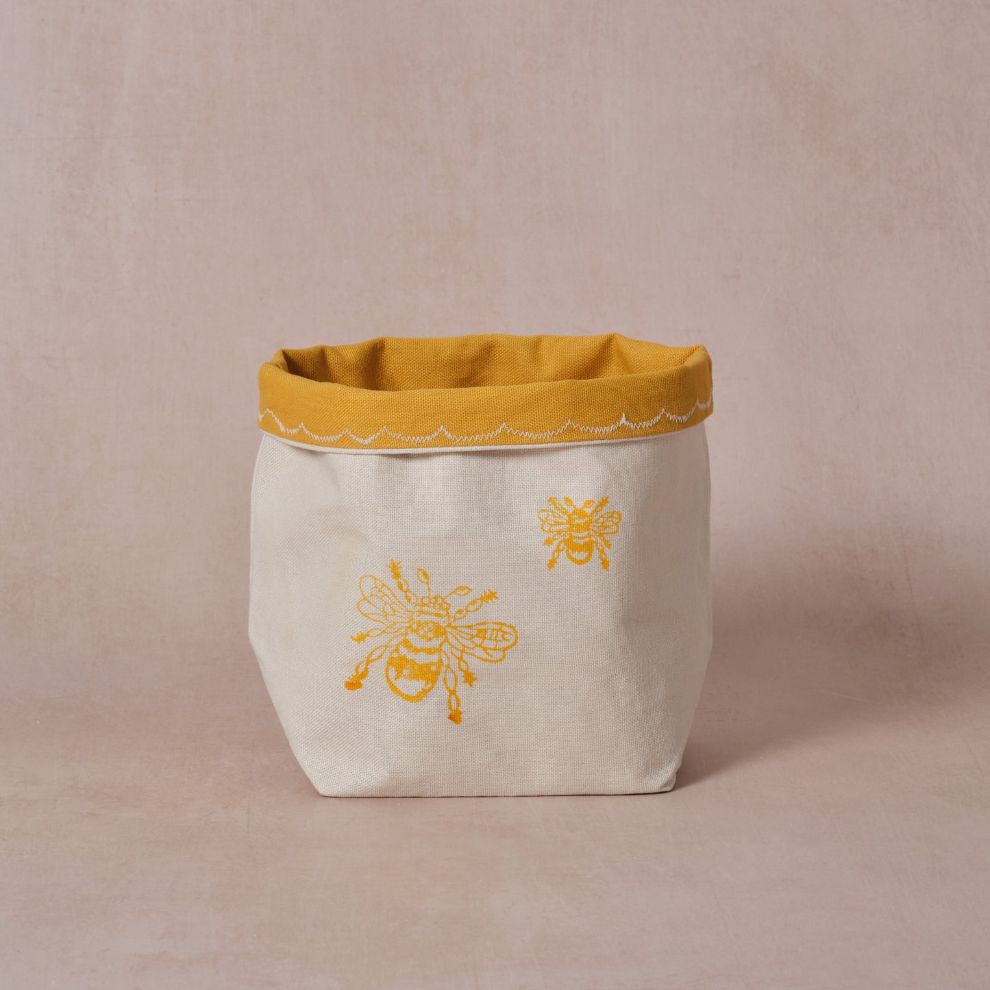 Reversible block-printed fabric storage basket in bees print, handmade cotton basket by Emena Home UK