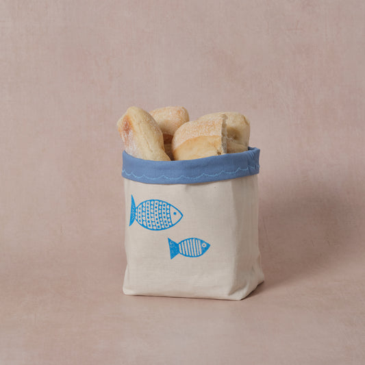 Reversible block-printed fabric storage basket in fish print, handmade cotton basket by Emena Home UK