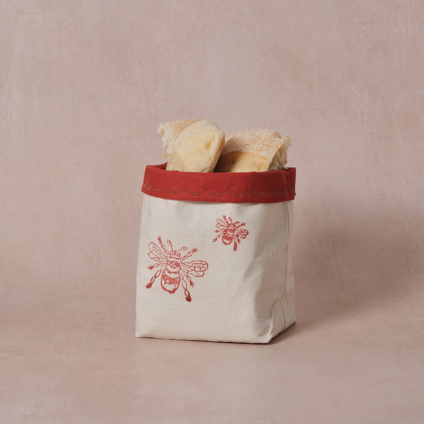 Reversible block-printed fabric storage basket in bees print, handmade cotton basket by Emena Home UK