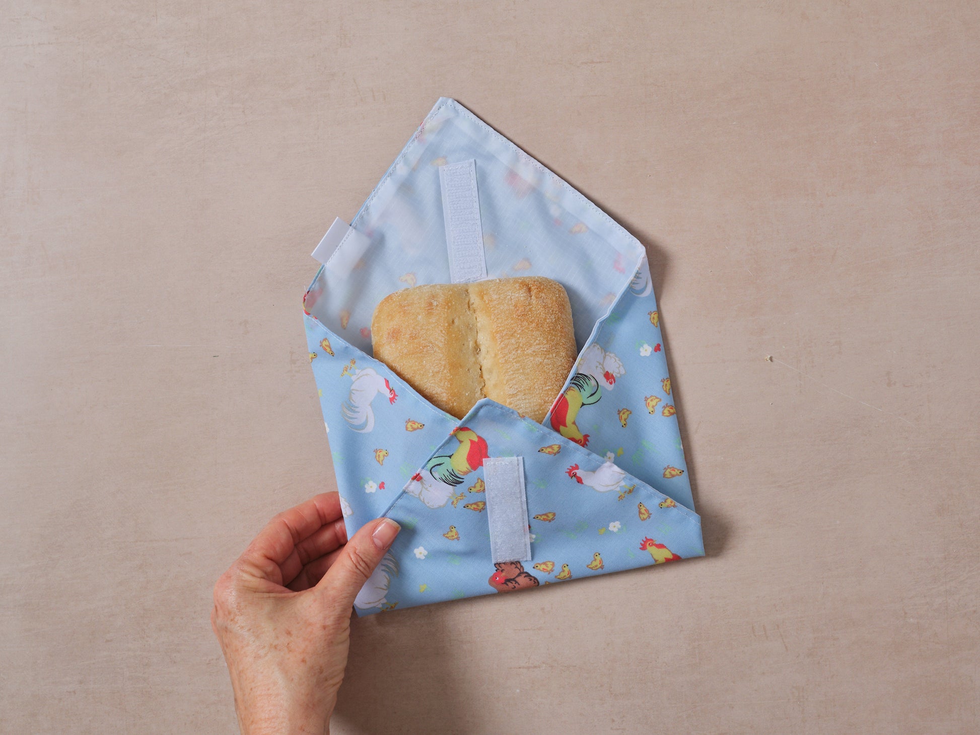 Reusable cotton sandwich wrap in farm chicken print, eco-friendly lunch wrap by Emena Home UK