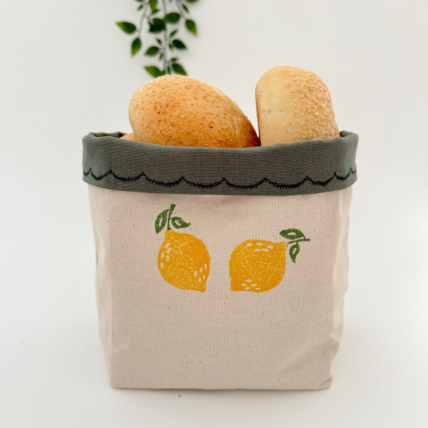 Reversible block-printed fabric storage basket in lemon print, handmade cotton basket by Emena Home UK