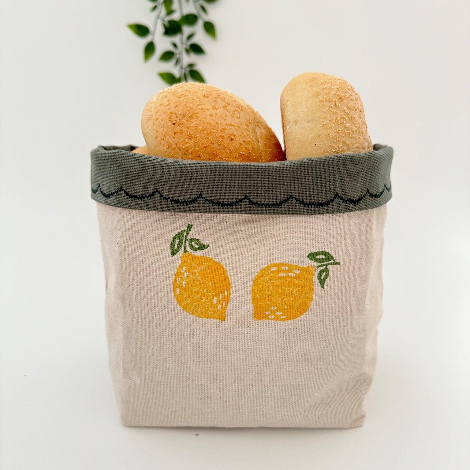 Reversible block-printed fabric storage basket in lemon print, handmade cotton basket by Emena Home UK