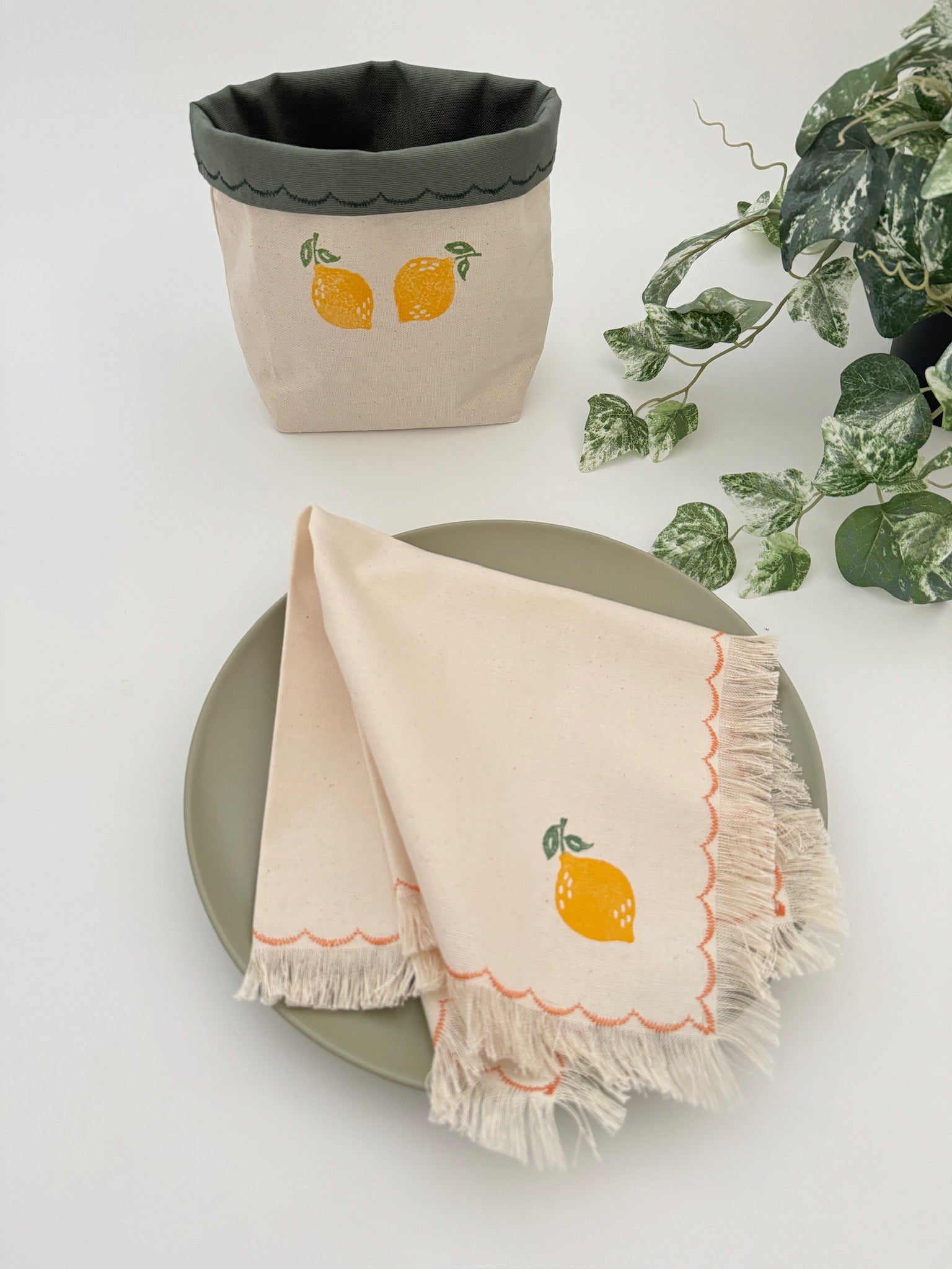 Reversible block-printed fabric storage basket in lemon print, handmade cotton basket by Emena Home UK