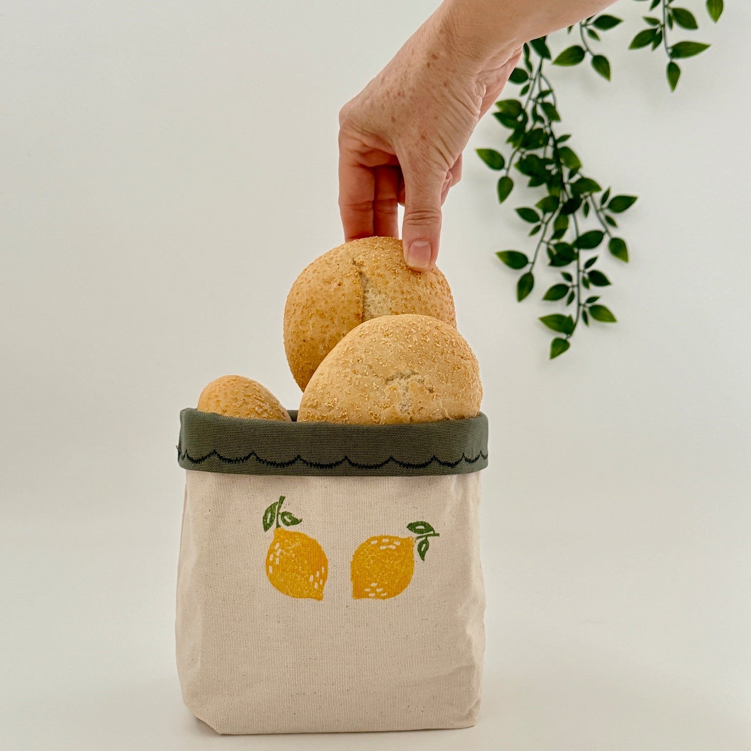 Reversible block-printed fabric storage basket in lemon print, handmade cotton basket by Emena Home UK