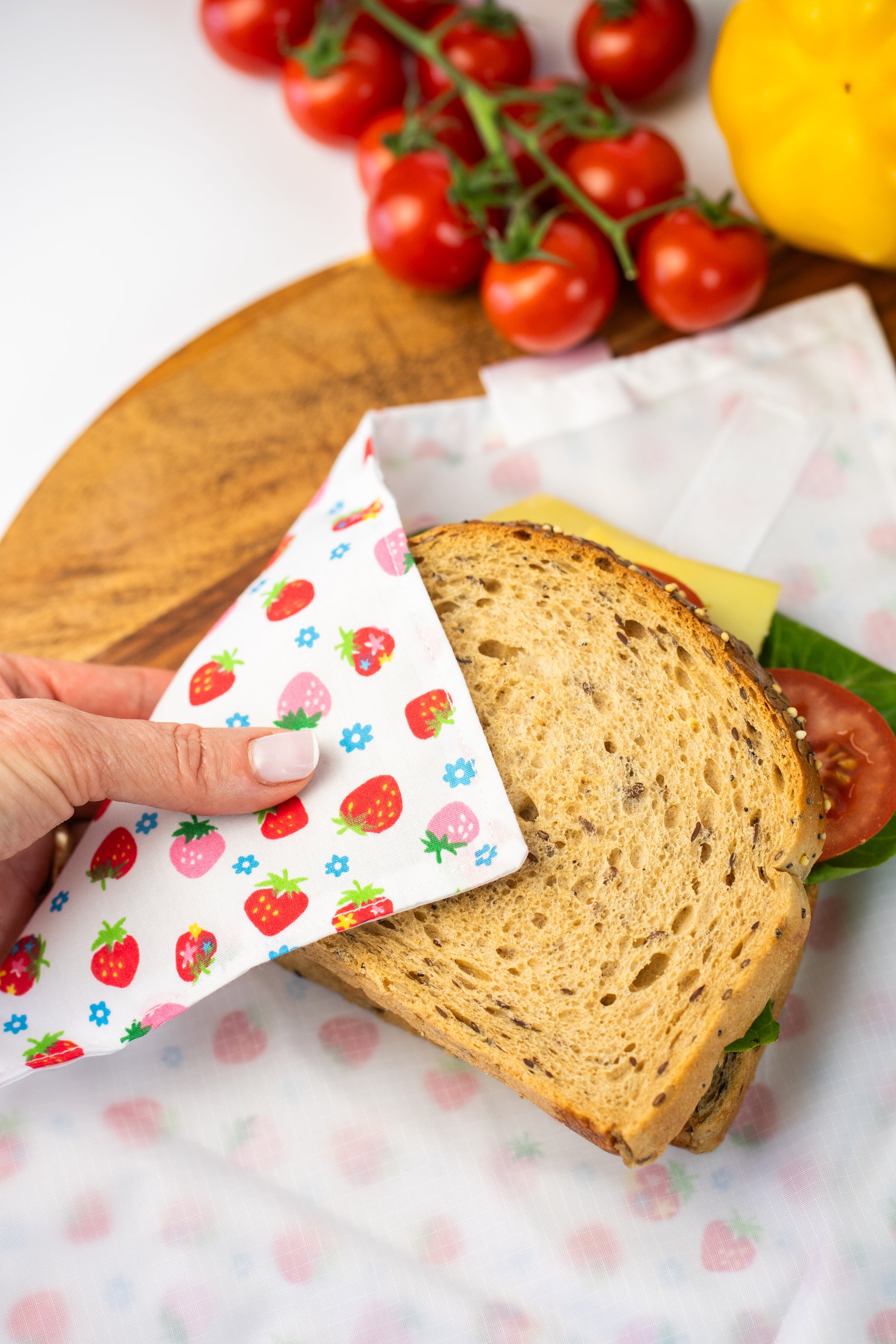 Reusable cotton sandwich wrap in strawberry print, eco-friendly lunch wrap alternative to plastic, Emena Home UK
