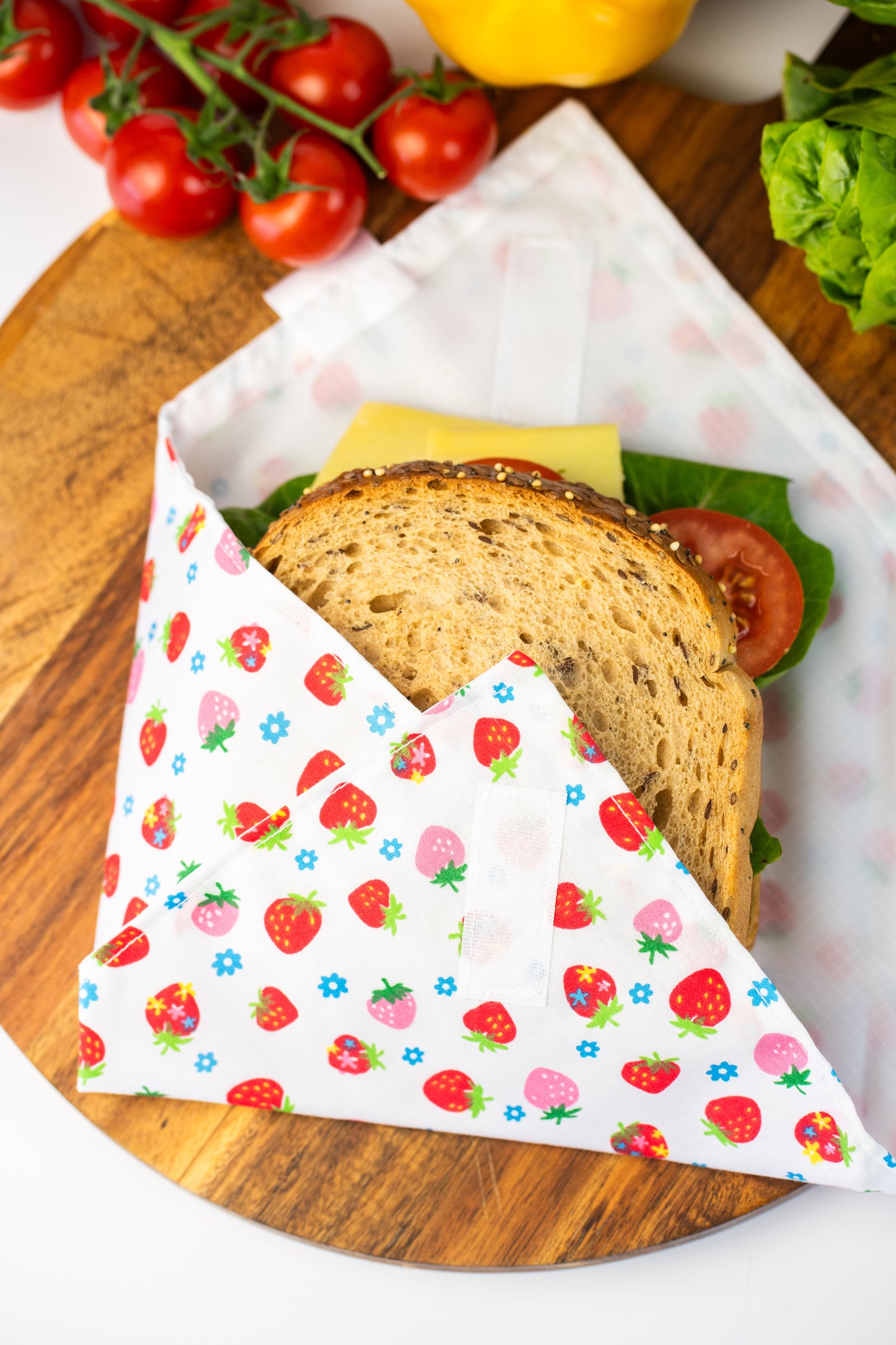 Reusable cotton sandwich wrap in strawberry print, eco-friendly lunch wrap alternative to plastic, Emena Home UK