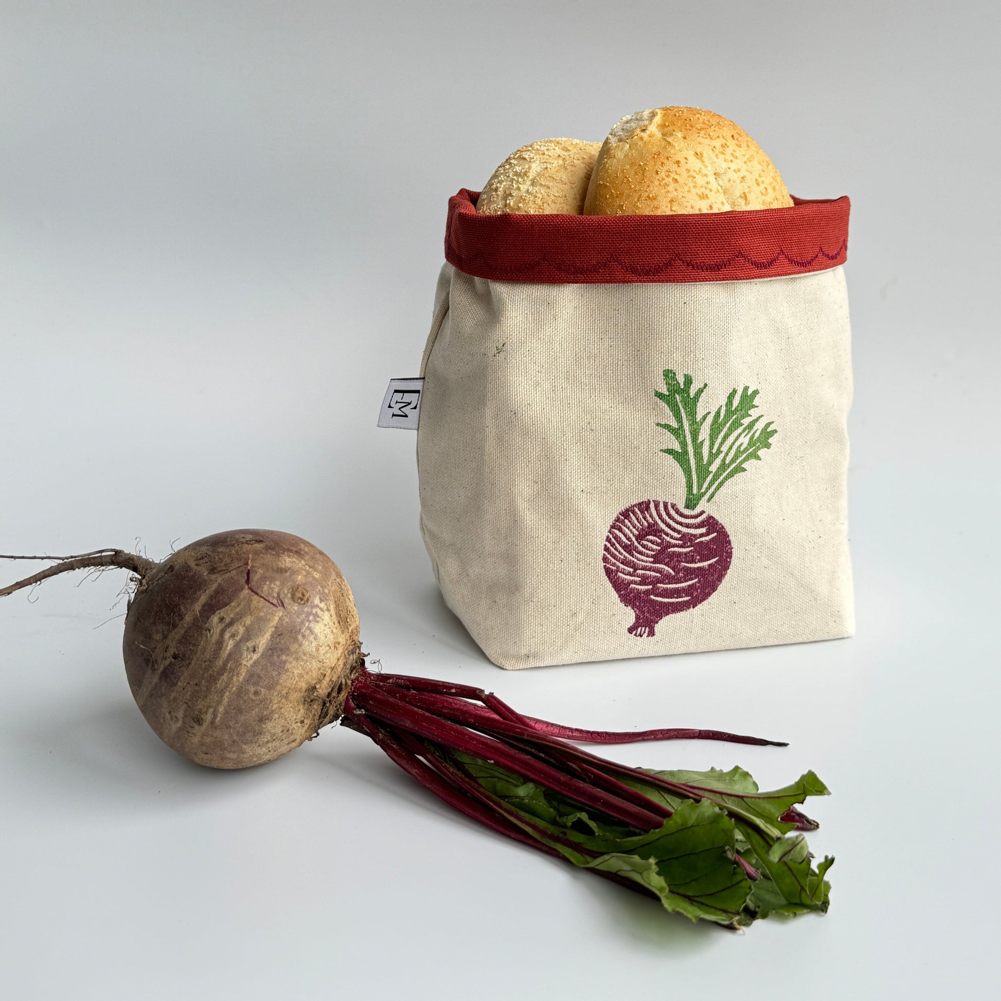 Reversible block-printed fabric storage basket in beet print, handmade cotton basket by Emena Home UK